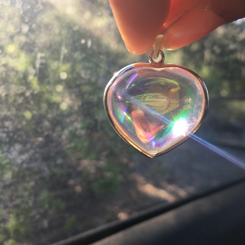 angel aura quartz pendant